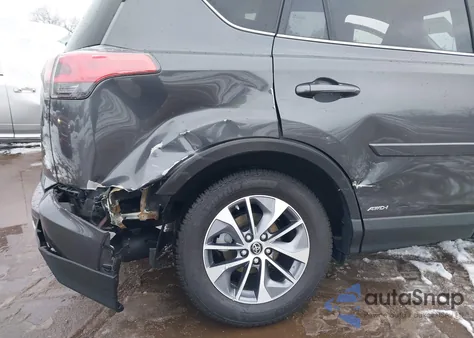 2016 Toyota Rav4 Hybrid Xle z USA, uszkodzony, nr VIN JTMRJREV2GD003868